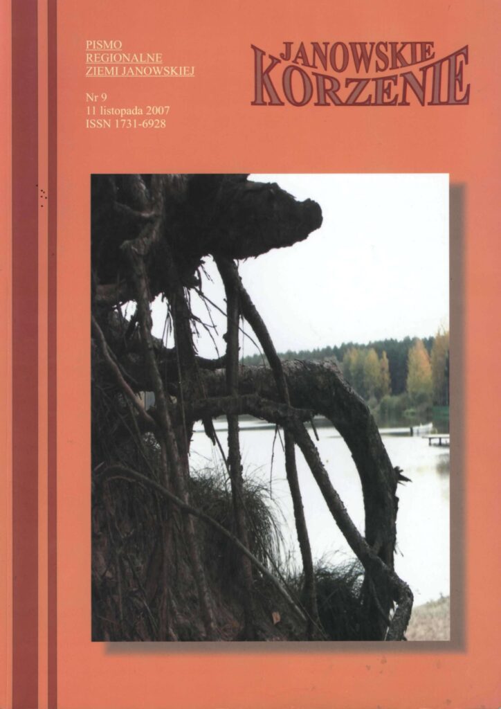 Korzenie drzewa na tle jeziora i lasu w jesiennych kolorach, na pomarańczowym tle okładki pisma regionalnego.