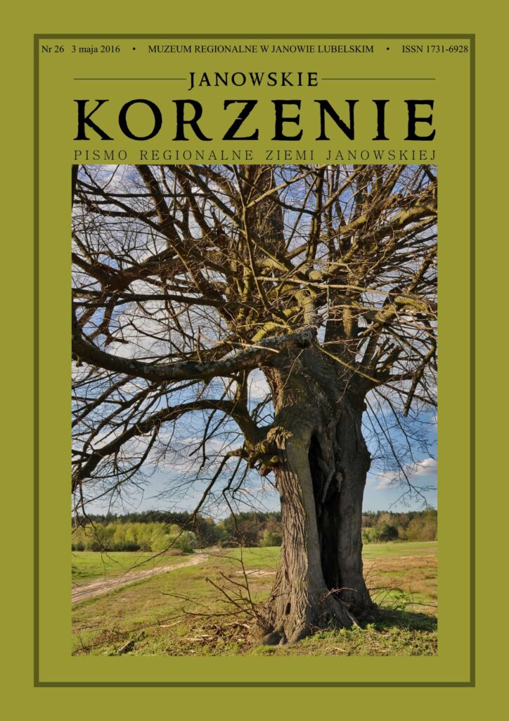 Stare drzewo bez liści na tle zielonej łąki i niebieskiego nieba z chmurami.