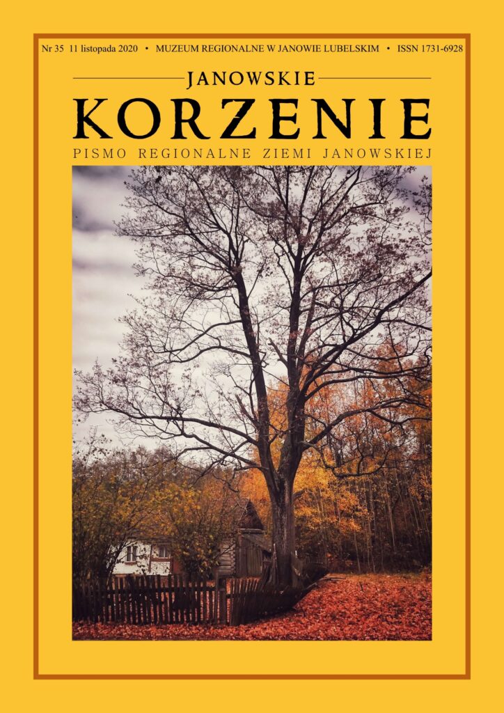 Jesienne drzewo bez liści przy drewnianym płocie, wokół żółto-pomarańczowe liście i dom w tle